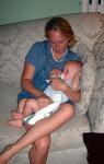 Sam Feeding Atticus_th.jpg 3.9K